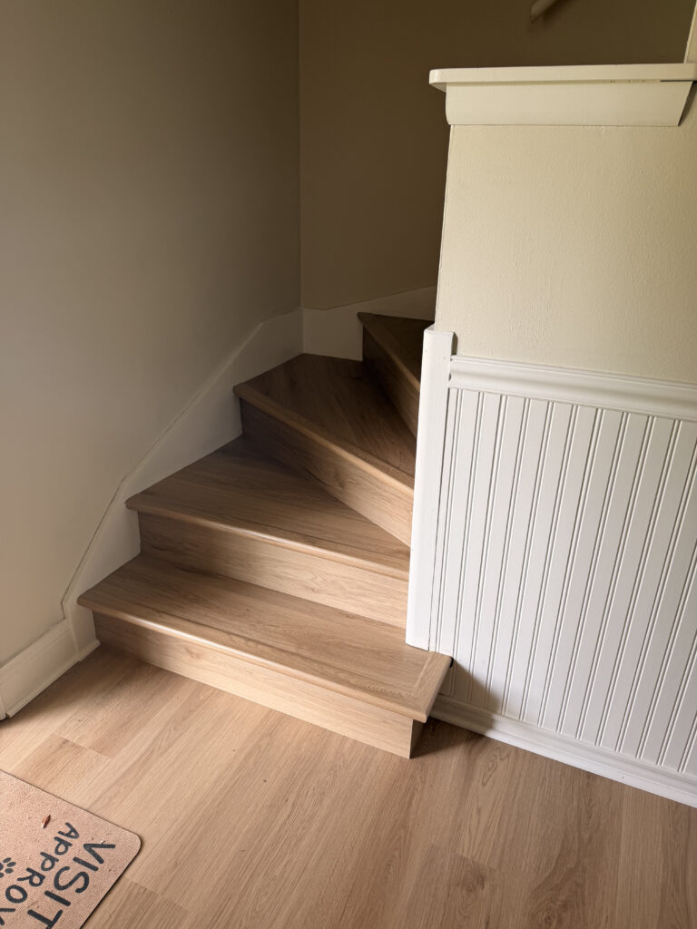Stair and flooring finish detail from Midwest LVP work