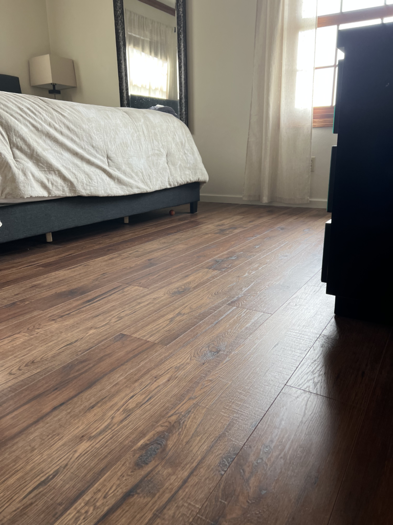 Finished walnut-look plank layout and room details