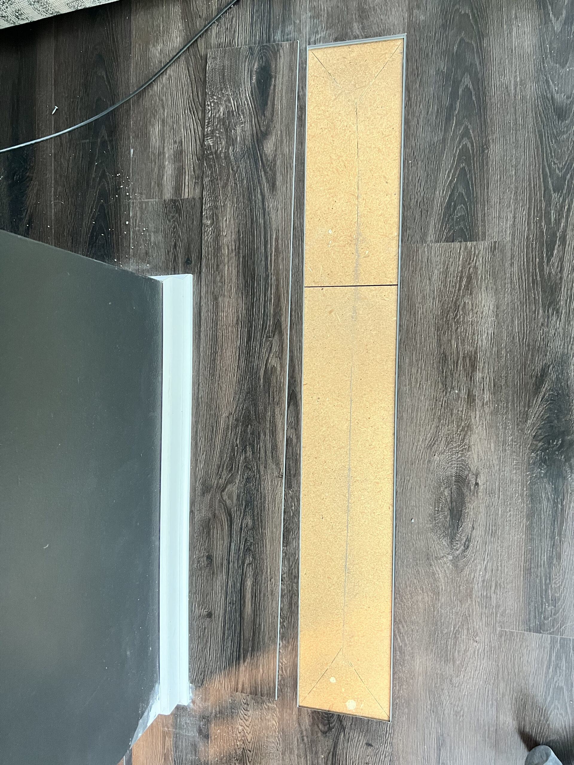 Second flooring repair area opened to the subfloor