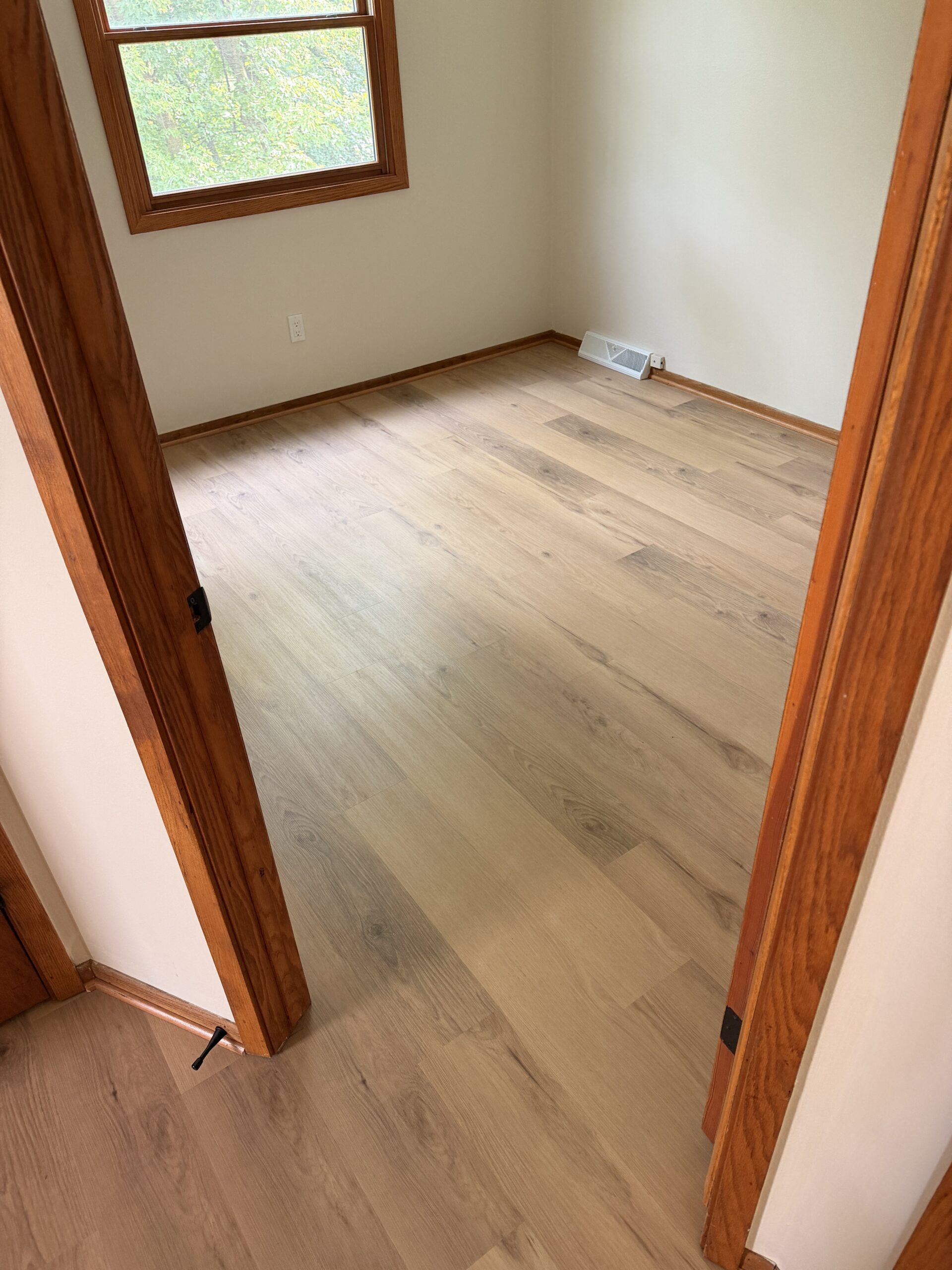 Navarra Maple LVP installed through the kitchen and connected area