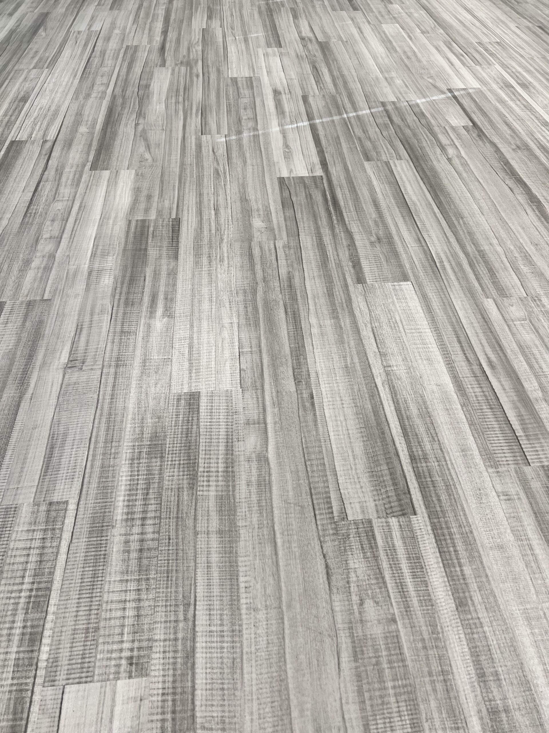 Gray wood-look LVP plank field