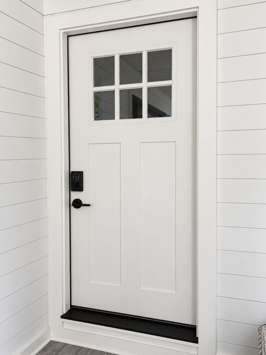 White entry door installation